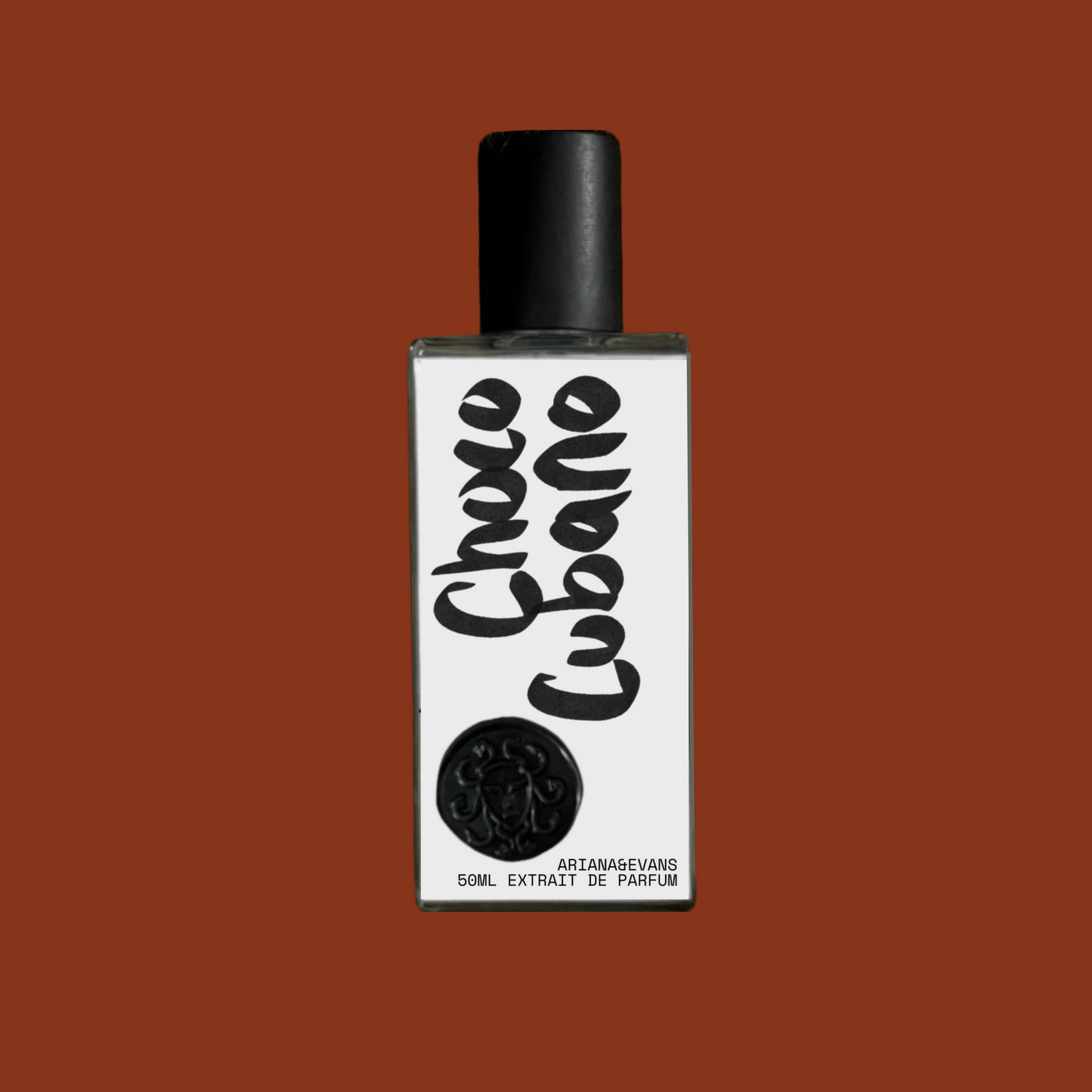 Perfume bottle with Choco Cubano Extrait de Parfum branding on a brown background