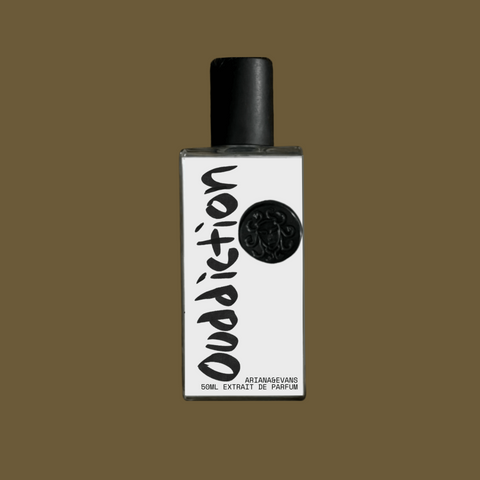 Perfume bottle labeled 'Oudiction' on a brown background. niche fragrances