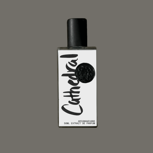 Perfume bottle labeled 'Cathedral' by Ariana & Evans on a taupe background. Indie Niche fragrances