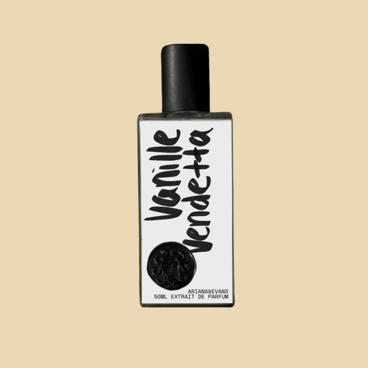 Perfume bottle labeled 'Vanille Vendetta' on a beige background